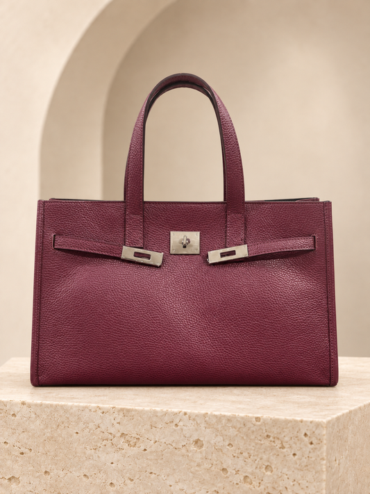 Tote con accessorio frontale decorativo